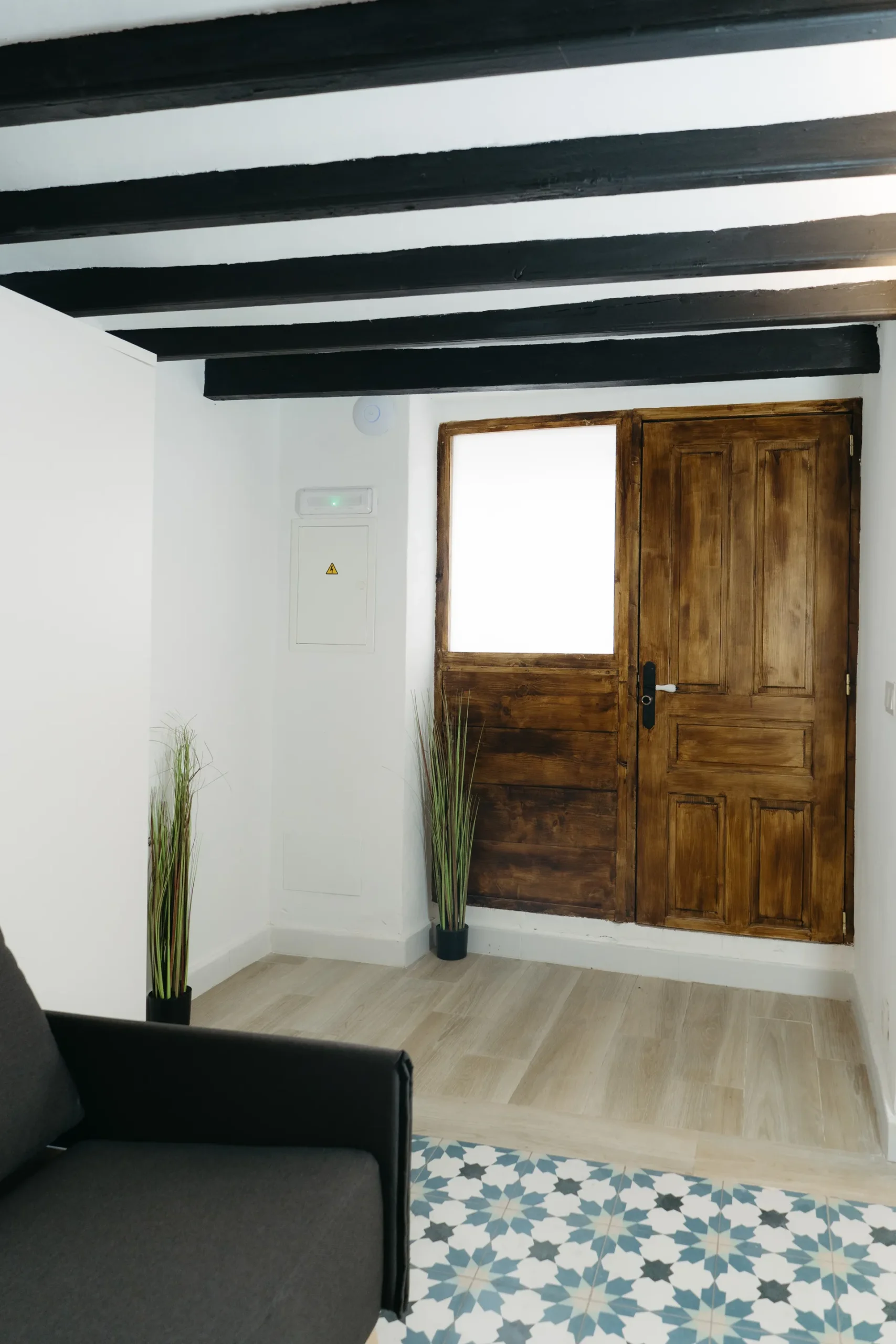 Courbu - Salón y entrada